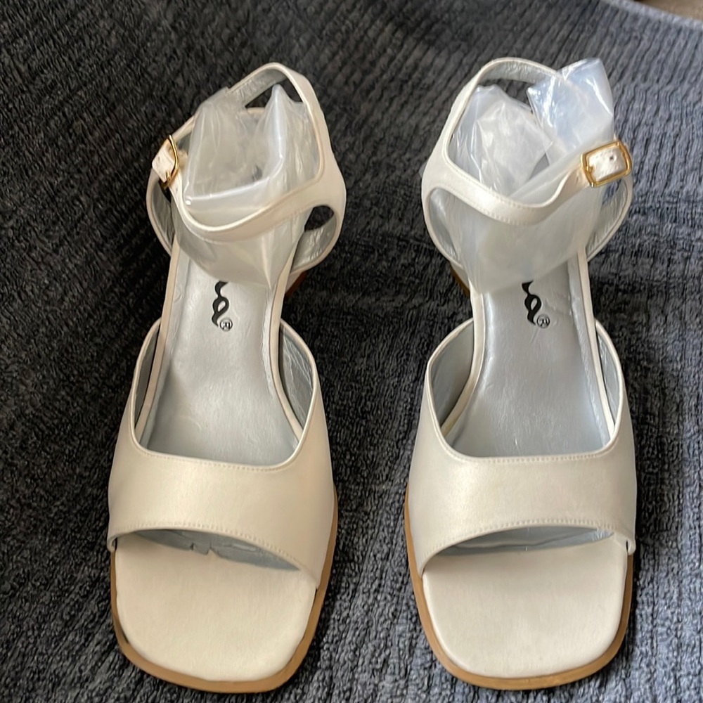 Nina-like new sandals.Cream color material.Size 9 1/2M  3 1/4 inch heel.